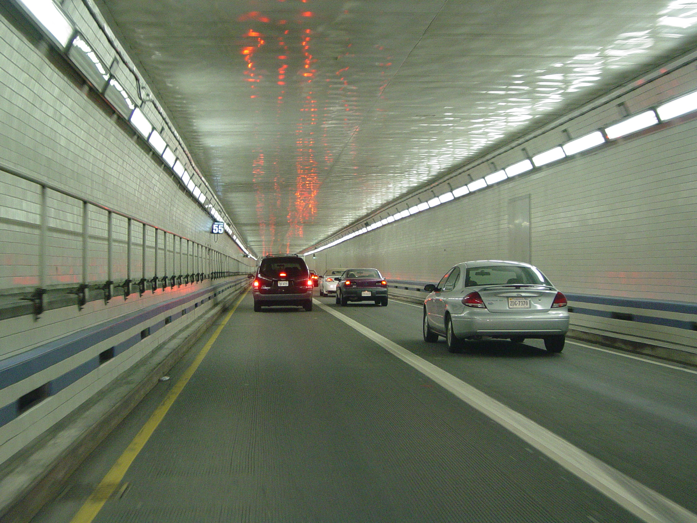 Cars driving in tunnel